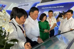 Bắt nhịp xu hướng phát triển của báo chí truyền thông số, Thông tấn xã Việt Nam giới thiệu Triển lãm không gian ảo tới khách tham quan tại Hội Báo toàn quốc năm 2024. (Ảnh: TTXVN)
