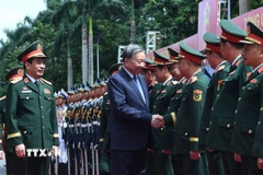 Tổng Bí thư Tô Lâm và các đồng chí lãnh đạo Quân ủy Trung ương, Bộ Quốc phòng. (Ảnh: Trọng Đức/TTXVN)