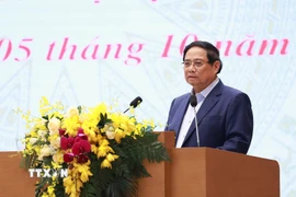 Thủ tướng Phạm Minh Chính phát động thi đua chào mừng Đại hội XIV của Đảng. (Ảnh: Dương Giang/TTXVN)