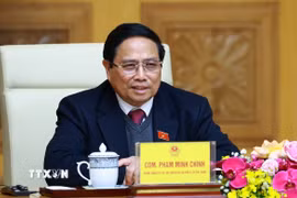 Thủ tướng Phạm Minh Chính phát biểu tại cuộc tiếp đồng chí Trần Cương, Bí thư Khu ủy Quảng Tây (Trung Quốc). (Ảnh: Dương Giang/TTXVN)