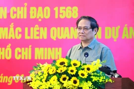 Thủ tướng Phạm Minh Chính làm việc với lãnh đạo Thành phố Hồ Chí Minh về tháo gỡ khó khăn liên quan đến các dự án. (Ảnh: Dương Giang/TTXVN)