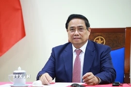 Thủ tướng Phạm Minh Chính điện đàm với Tổng thống Angola João Manuel Gonçalves Lourenço. (Ảnh: Dương Giang/TTXVN)