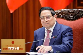 Thủ tướng Phạm Minh Chính chủ trì họp Thường trực Chính phủ về thúc đẩy các động lực nhằm ổn định kinh tế vĩ mô. (Ảnh: Dương Giang/TTXVN)