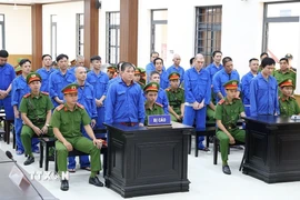 Các bị cáo tại phiên tòa sơ thẩm. (Ảnh: Công Mạo/TTXVN)