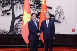 Chủ tịch nước Lương Cường hội kiến Ủy viên trưởng Nhân đại toàn quốc Trung Quốc Triệu Lạc Tế. (Ảnh: Lâm Khánh/TTXVN)