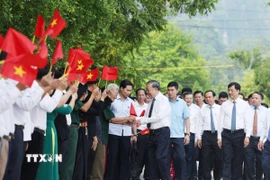 Tổng Bí thư Tô Lâm với nhân dân xã Tân Trào, tỉnh Tuyên Quang. (Ảnh: Thống Nhất/TTXVN)