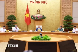 Thủ tướng Phạm Minh Chính chủ trì Phiên họp Chính phủ về tình hình phân cấp, phân quyền.(Ảnh: Dương Giang/TTXVN)