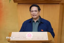 Thủ tướng Phạm Minh Chính chủ trì họp Chính phủ để đánh giá việc vận hành mô hình chính quyền địa phương 2 cấp. (Ảnh: Dương Giang/TTXVN)