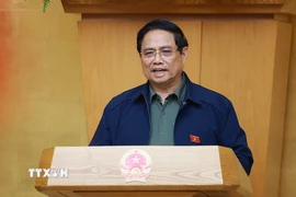 Thủ tướng Phạm Minh Chính chủ trì họp Chính phủ để đánh giá việc vận hành mô hình chính quyền địa phương 2 cấp. (Ảnh: Dương Giang/TTXVN)