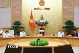 Thủ tướng Phạm Minh Chính chủ trì họp Chính phủ để đánh giá việc vận hành mô hình chính quyền địa phương 2 cấp.(Ảnh: Dương Giang/TTXVN)