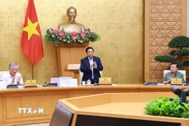 Thủ tướng Phạm Minh Chính chủ trì cuộc họp Chính phủ chuyên đề về việc sắp xếp, tổ chức lại đơn vị hành chính các cấp. (Ảnh: Dương Giang/TTXVN)