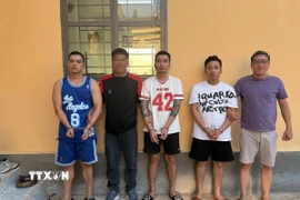 3 đối tượng chính trong vụ án cướp tài sản bị bắt giữ khi đang trốn tại thôn Nông Trường, xã Ia Glai, huyện Chư Sê, tỉnh Gia Lai. (Ảnh: TTXVN phát)