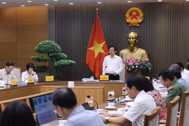 Phó Thủ tướng Hồ Quốc Dũng chủ trì họp Hội đồng thẩm định điều chỉnh Quy hoạch sử dụng đất quốc gia. (Ảnh: Lâm Khánh/TTXVN)