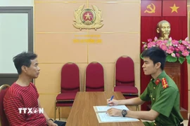 Đối tượng Hoàng Cao Sơn tại cơ quan Công an. (Ảnh: TTXVN phát)