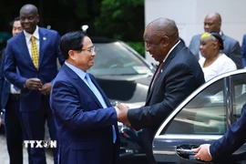 Thủ tướng Phạm Minh Chính hội kiến Tổng thống Cộng hòa Nam Phi Matamela Cyril Ramaphosa. (Ảnh: Dương Giang/TTXVN)