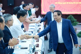 Thủ tướng Phạm Minh Chính làm việc với Ban Thường vụ Thành uỷ Đà Nẵng về tình hình phát triển kinh tế-xã hội. (Ảnh: Dương Giang/TTXVN)