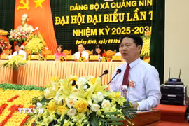 Ông Phạm Trung, Bí thư Đảng ủy xã Quảng Ninh nhiệm kỳ 2025-2030 phát biểu nhận nhiệm vụ. (Ảnh: Nguyên Linh/TTXVN)