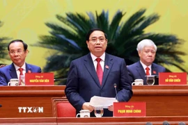 Đồng chí Phạm Minh Chính, Ủy viên Bộ Chính trị, Thủ tướng Chính phủ thay mặt Đoàn Chủ tịch điều hành phiên khai mạc Đại hội. (Ảnh: TTXVN)