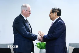 Thủ tướng Phạm Minh Chính tiếp ông Neil Pollock, Phó Chủ tịch Phòng Thương mại và Công nghiệp Nam Phi. (Ảnh: Dương Giang/TTXVN)