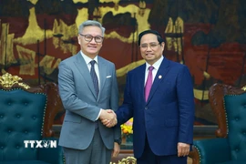 Thủ tướng Phạm Minh Chính tiếp Bộ trưởng Bộ Ngoại giao Lào Thongsavanh Phomvihane. (Ảnh: Dương Giang/TTXVN)