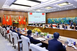 Quang cảnh Phiên họp lần thứ nhất Ủy ban hợp tác giữa Quốc hội Việt Nam và Nhân đại toàn quốc Trung Quốc. (Ảnh: Doãn Tấn/TTXVN)