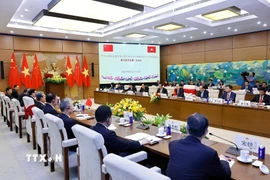 Quang cảnh Phiên họp lần thứ nhất Ủy ban hợp tác giữa Quốc hội Việt Nam và Nhân đại toàn quốc Trung Quốc. (Ảnh: Doãn Tấn/TTXVN)