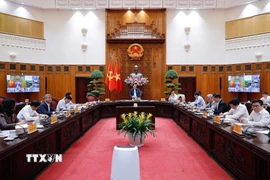 Thủ tướng Phạm Minh Chính chủ trì họp Thường trực Chính phủ để rà soát tình hình triển khai tiến độ các dự án đường sắt. (Ảnh: Dương Giang/TTXVN)