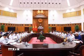 Thủ tướng Phạm Minh Chính chủ trì cuộc họp Thường trực Chính phủ với các địa phương để tháo gỡ khó khăn, vướng mắc cho các dự án tồn đọng. (Ảnh: Dương Giang/TTXVN)