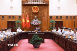 Thủ tướng Phạm Minh Chính chủ trì cuộc họp Thường trực Chính phủ với các địa phương để tháo gỡ khó khăn, vướng mắc cho các dự án tồn đọng. (Ảnh: Dương Giang/TTXVN)