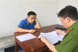 Cơ quan điều tra hỏi cung các bị can. (Nguồn: Công an Quảng Ninh)