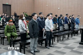 Các bị cáo tại phiên tòa ngày 27/12/2024. (Ảnh: Kim Anh/TTXVN)