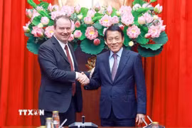 Đại tướng Lương Tam Quang, Bộ trưởng Bộ Công an tiếp Phó Đại diện Thương mại Hoa Kỳ Rick Switzer. (Ảnh: Phạm Kiên/TTXVN)