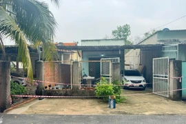Hiện trường căn nhà nơi xảy ra vụ việc. (Ảnh: TXVN phát)