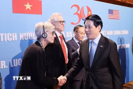 Chủ tịch nước Lương Cường gặp gỡ những người bạn, nhân dân tiến bộ Hoa Kỳ. (Ảnh: Lâm Khánh/TTXVN)