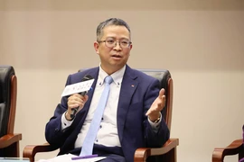 Đại sứ Việt Nam tại Phạm Thanh Bình trả lời nhiều câu hỏi mà đại biểu phía Trung Quốc quan tâm về tình hình Việt Nam cũng như về quan hệ giữa hai nước. (Ảnh: Công Tuyên/TTXVN)