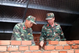 Lực lượng Ban Chỉ huy phòng thủ khu vực 1 Sơn Tịnh (Quảng Ngãi) tham gia Chiến dịch Quang Trung. (Ảnh: Cao Nguyên/TTXVN)