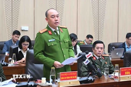 Đại tá Nguyễn Đức Long, Phó Giám đốc Công an thành phố Hà Nội trả lời câu hỏi của phóng viên các cơ quan thông tấn, báo chí. (Ảnh: Phạm Kiên/TTXVN)