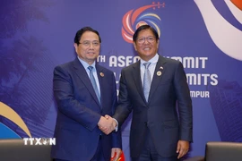 Thủ tướng Phạm Minh Chính gặp Tổng thống Philippines Ferdinand Romualdez Marcos Jr.. (Ảnh: Dương Giang/TTXVN)