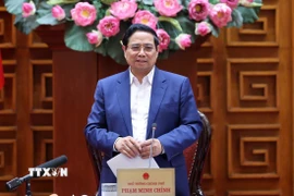 Thủ tướng Phạm Minh Chính chủ trì họp về triển khai các công trình hạ tầng phục vụ Tuần lễ Cấp cao APEC 2027. (Ảnh: Dương Giang/TTXVN)