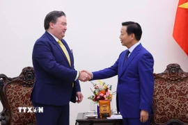 Phó Thủ tướng Trần Hồng Hà tiếp Đại sứ Hoa Kỳ tại Việt Nam Marc Knapper. (Ảnh: Văn Điệp/TTXVN)