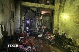 Hiện trường vụ cháy tại tầng 1 của ngôi nhà tại Trung Liệt, Hà Nội. (Ảnh: TTXVN phát)