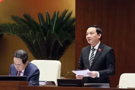 Bộ trưởng Bộ Tư pháp Nguyễn Hải Ninh phát biểu giải trình, làm rõ một số vấn đề đại biểu Quốc hội nêu. (Ảnh: Doãn Tấn/TTXVN)