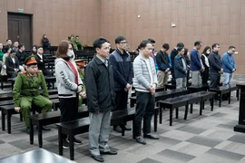 Các bị cáo tại phiên tòa ngày 27/2. (Ảnh: Kim Anh/TTXVN)