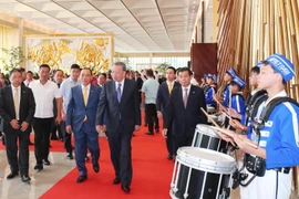 Tổng Bí thư Tô Lâm đến dự lễ khai mạc triển lãm. (Ảnh: Trọng Đức/TTXVN)