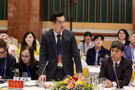 Đại diện kiều bào tiêu biểu phát biểu tại buổi gặp mặt do Ủy ban Nhân dân thành phố Hà Nội tổ chức vào ngày 6/2. (Ảnh: Vũ Quang/TTXVN)