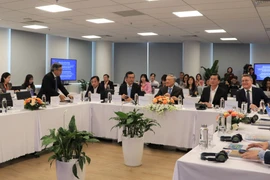 Khóa đào tạo Nhà quản lý Trung tâm Tài chính quốc tế với chủ đề: “Thiết kế sản phẩm tài chính và thu hút vốn đầu tư tại Trung tâm Tài chính Quốc tế”. (Ảnh: Huyền Trang/TTXVN)