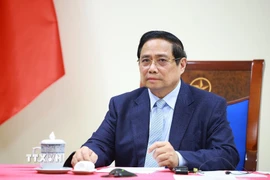 Thủ tướng Phạm Minh Chính điện đàm với Thủ tướng Kuwait Sheikh Ahmad Abdullah Al-Ahmad Al Sabah. (Ảnh: Dương Giang/TTXVN)