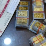 Giá vàng trong nước giao dịch quanh mức 156,4 triệu đồng mỗi lượng. (Ảnh: Vietnam+)