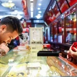 Giá vàng trong nước đi ngang, giao dịch quanh mức 156,4 triệu đồng. (Ảnh: Vietnam+)