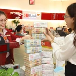 Tăng trưởng tín dụng cao nhất 10 năm. (Ảnh: Vietnam+)